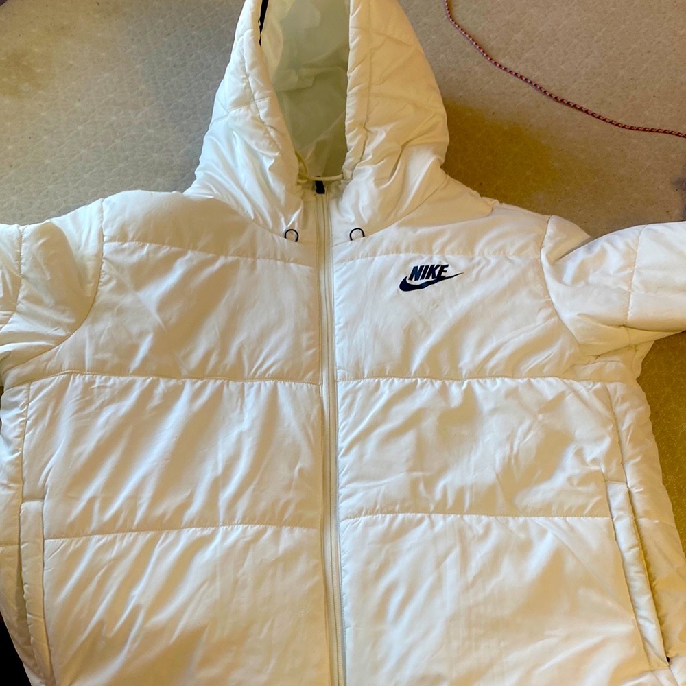 white puffer nike coat